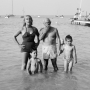 Picasso with his children Maya, Claude and Paloma at the beach. Golfe-Juan, 1953