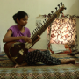 Joueuse de sitar dans une maison Jane Drew 