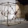 Mario Merz Untitled, 1990 Iron, glass, branches and clay  210 x 190 x 190 cm  Repository of the artist at the Capc Musée d’art contemporain in Bordeaux since 1990. © Adagp, Paris, 2020   Photo : Frédéric Desmesure