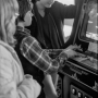 Teenagers Playing video Game Machine