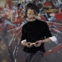 Georges Mathieu devant son tableau « La Victoire de Denain » au Musée d’Art Moderne de Paris.1963 